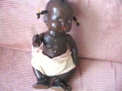9'' BLACK COMPOSITION 1940S BABY DOLL WITH 3 TOP KNOTS 2704